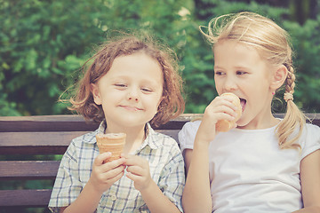 Image showing Two happy children  playing in the park at the day time.