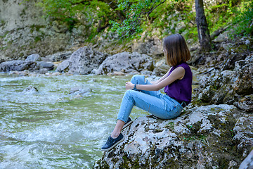 Image showing The girl at the river