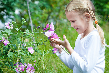 Image showing portrait of a beautiful young girl with wildflowers