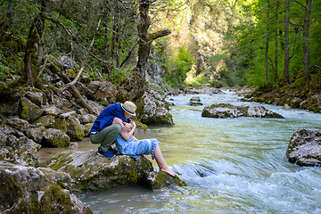 Image showing The girl with guy at the river