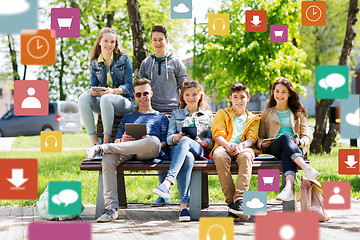 Image showing group of teenage students with tablet pc outdoors