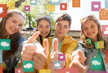 Image showing teenage friends or students showing thumbs up