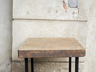 Image showing outdoor table near the stucco grunge wall