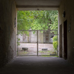 Image showing Tunnel and gates to the yard