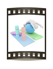 Image showing 3d man on a karemat with fitness ball. 3D illustration. The film