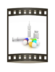 Image showing Syringe, tablet, pill jar. 3D illustration. The film strip