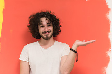 Image showing young man with funny hair over color background