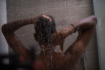 Image showing African American woman in the shower