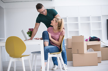 Image showing Young couple moving in a new home