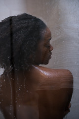 Image showing African American woman in the shower