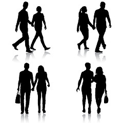 Image showing Set Silhouette man and woman walking hand in hand