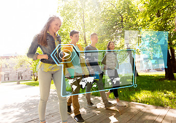 Image showing group of happy teenage students walking outdoors