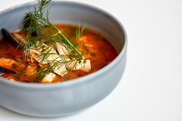 Image showing close up of seafood soup with fish and mussels