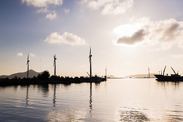 Image showing turbines at wind farm on sea shore