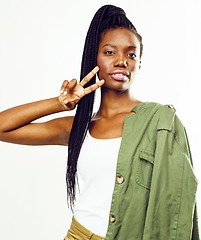 Image showing young pretty african-american girl posing cheerful emotional on white background isolated, lifestyle people concept 