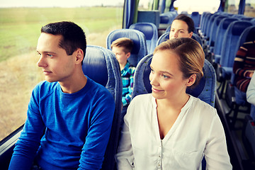 Image showing happy couple or passengers in travel bus