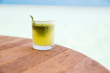 Image showing glass with drink or cocktail on bar table