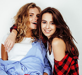 Image showing best friends teenage girls together having fun, posing emotional on white background, besties happy smiling, lifestyle people concept 