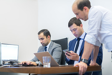 Image showing Corporate businessteam working in modern office.