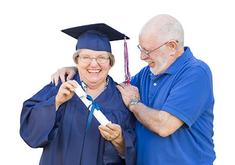 Image showing Senior Adult Woman Graduate in Cap and Gown Being Congratulated 