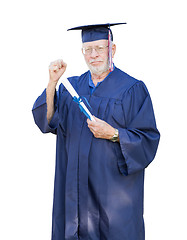 Image showing Proud Senior Adult Man Graduate In Cap and Gown Holding Diploma 