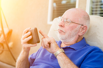 Image showing Senior Adult Man Using Smart Cell Phone.