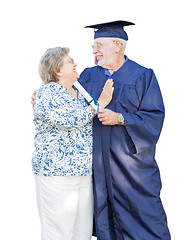 Image showing Senior Adult Man Graduate in Cap and Gown Being Congratulated By
