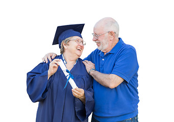 Image showing Senior Adult Woman Graduate in Cap and Gown Being Congratulated 