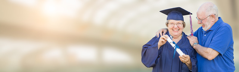 Image showing Banner of Senior Adult Woman Graduate In Cap and Gown Being Cong