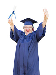 Image showing Happy Senior Adult Woman Graduate In Cap and Gown Holding Diplom