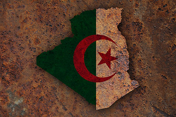 Image showing Map and flag of Algeria on rusty metal