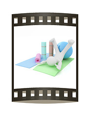 Image showing 3d man on a karemat with fitness ball. 3D illustration. The film