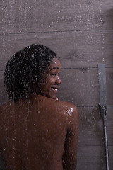 Image showing African American woman in the shower