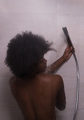 Image showing African American woman in the shower