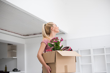 Image showing girl moving in the new apartment