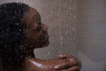 Image showing African American woman in the shower