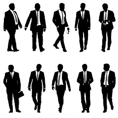 Image showing Set silhouette businessman man in suit with tie on a white background. illustration