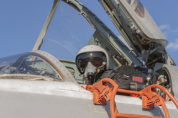 Image showing Military pilot in the cockpit of a jet aircraft