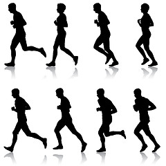 Image showing Set of silhouettes. Runners on sprint, men and woman