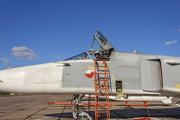 Image showing Military pilot in the cockpit of a jet aircraft