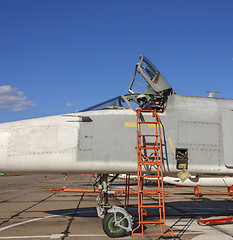 Image showing Military pilot in the cockpit of a jet aircraft