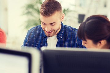 Image showing happy creative team or students working at office