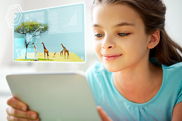 Image showing close up of smiling girl with tablet pc at home