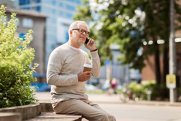 Image showing happy senior man calling on smartphone in city