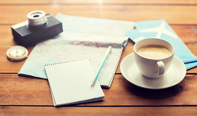 Image showing close up of notepad with map and travel tickets
