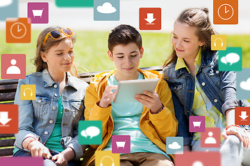 Image showing happy teenage friends with tablet pc outdoors