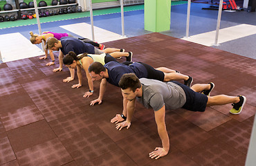 Image showing group of people exercising in gym