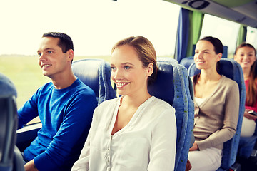 Image showing group of happy passengers in travel bus