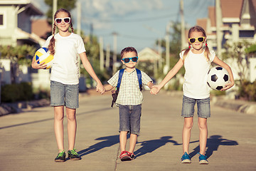 Image showing Happy children standing on the road