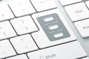Image showing Medicine concept: Pills Blister on computer keyboard background